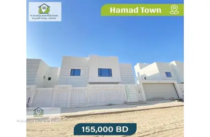 Outdoor Building image for: Villa - 4 Bedrooms - 5 Bathrooms for sale in Hamad Town - Northern Governorate, Image 1