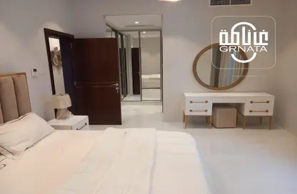 Room / Bedroom image for: Apartment - 2 Bedrooms - 4 Bathrooms for rent in Hidd - Muharraq Governorate, Image 1