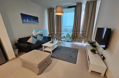 Living Room image for: Apartment - 1 Bedroom - 1 Bathroom for sale in Marassi Boulevard - Diyar Al Muharraq - Muharraq Governorate, Image 1